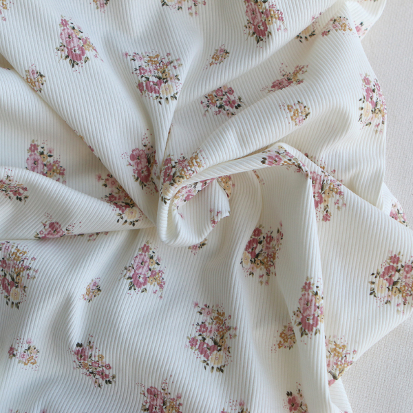 Jersey coton côtes fines à motif fleuri rose