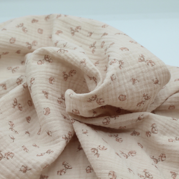 Double gaze de coton coloris nude naturel à motifs fleurs de coton