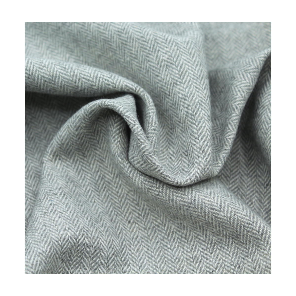 Tissu chevron texturé coton / laine coloris gris perle Tissu chevron texturé coton / laine coloris gris perle