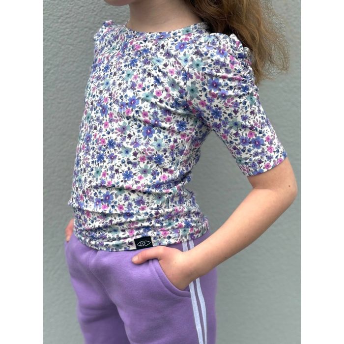 Jersey de coton fleurs denses fond brun foncé