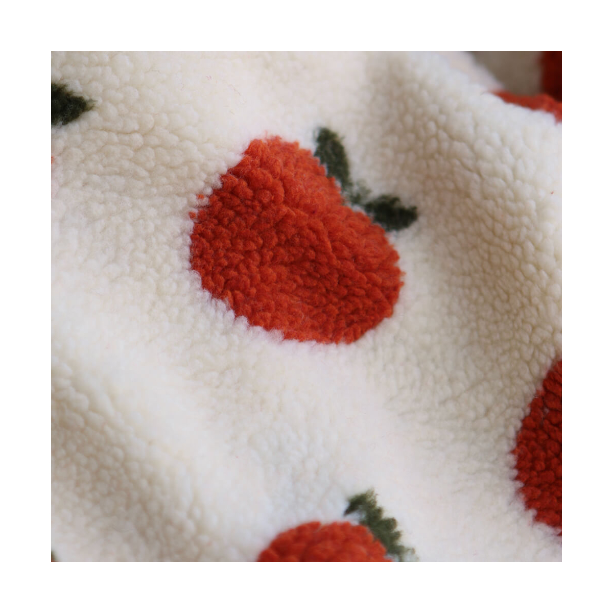 Teddy / moumoute bouclé fond écru motif pommes