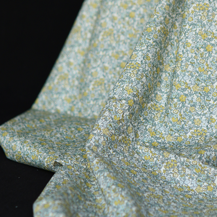 Eleanore - Popeline douce coton organique fond ivoire fleuri vert et jaune