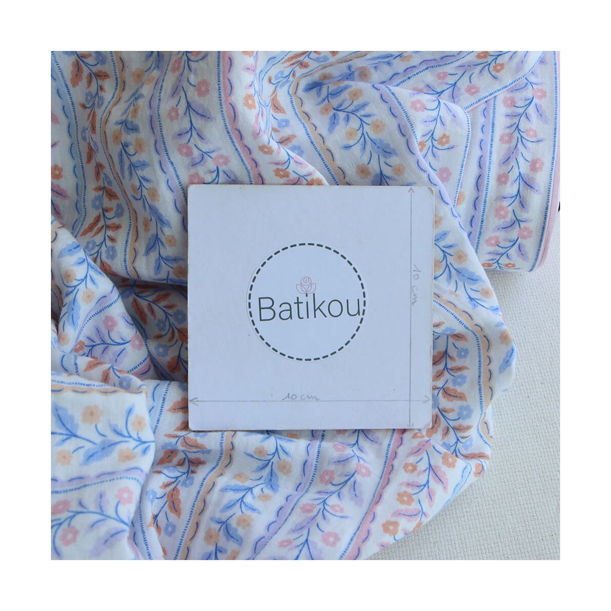 Tissu double gaze de coton bio guirlandes fleuries fond blanc