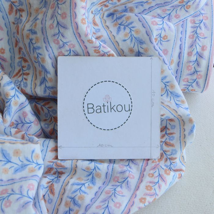 Tissu double gaze de coton bio guirlandes fleuries fond blanc