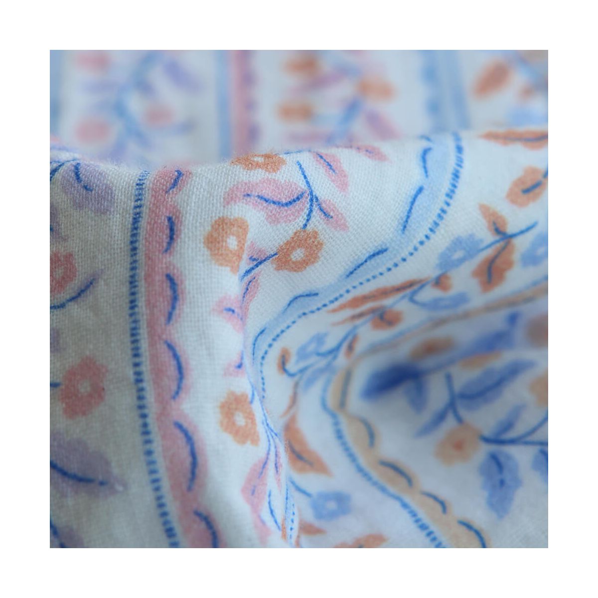 Tissu double gaze de coton bio guirlandes fleuries fond blanc