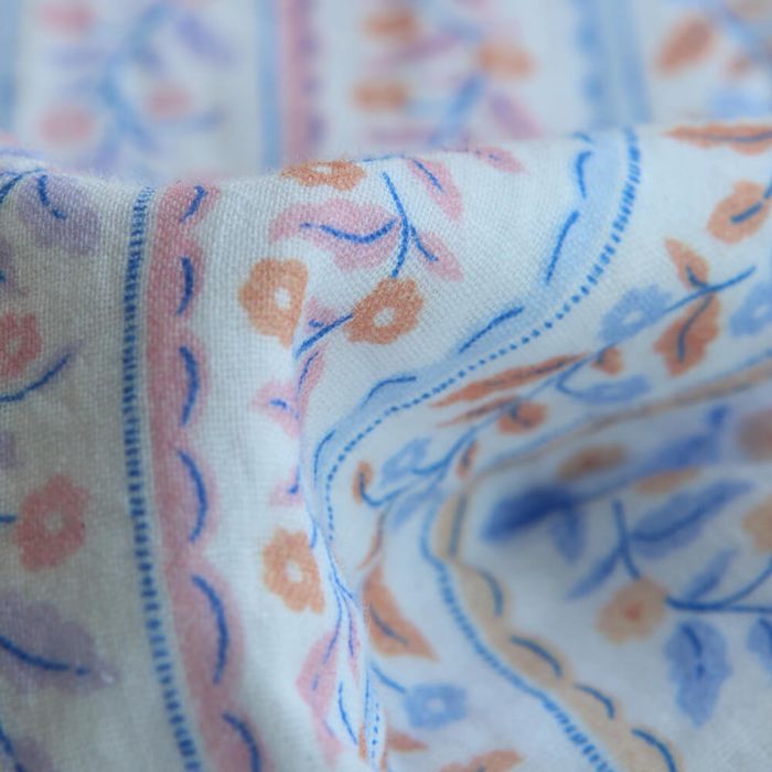 Tissu double gaze de coton bio guirlandes fleuries fond blanc