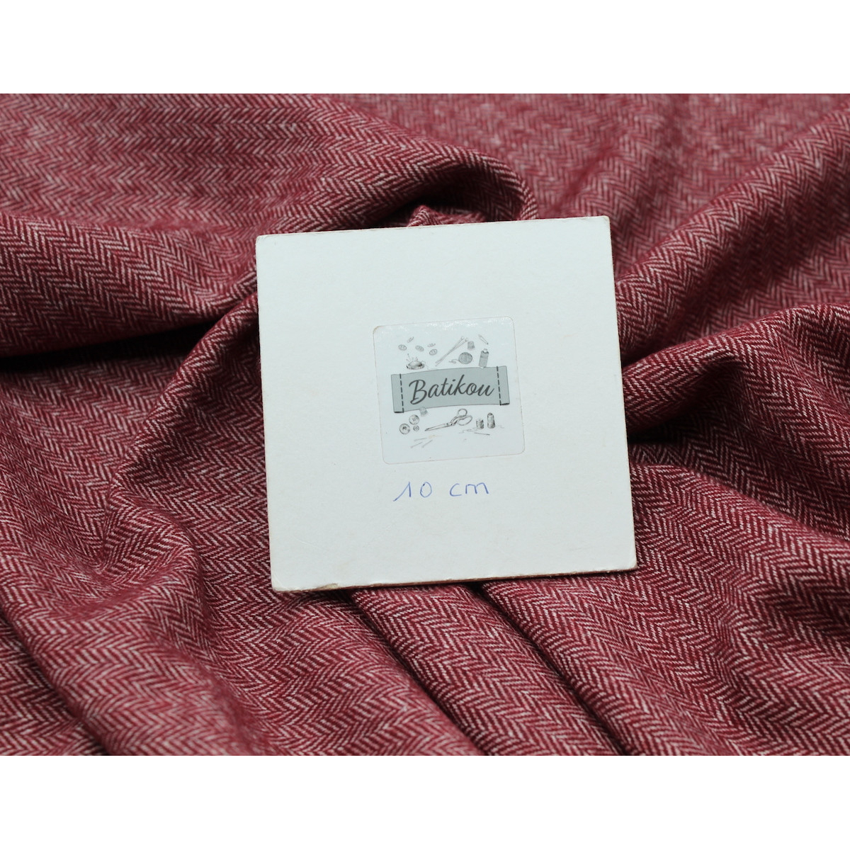 Tissu chevron texturé coton / laine coloris bordeaux Tissu chevron texturé coton / laine coloris bordeaux