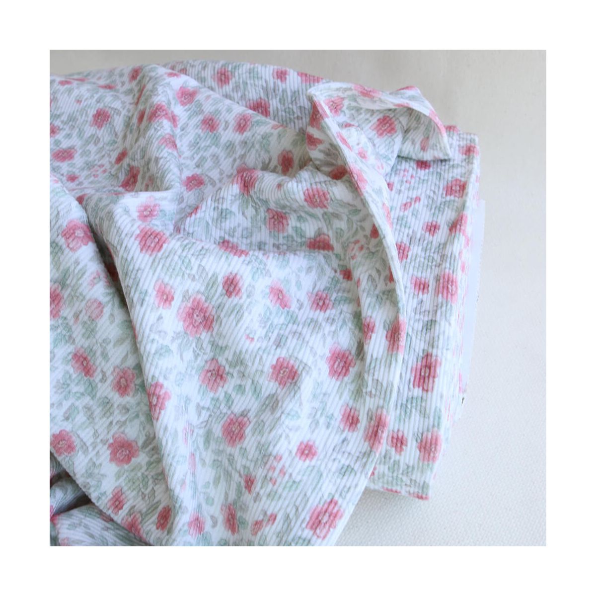 Jersey coton côtes fines à motif fleuri rose et vert d'eau