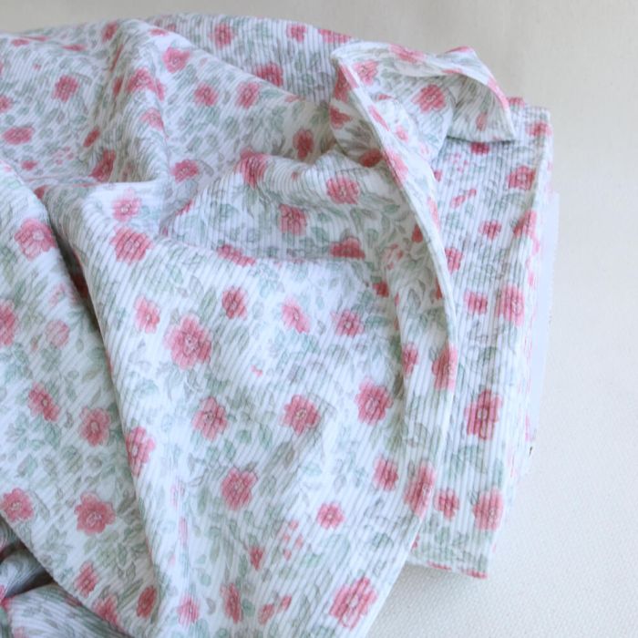 Jersey coton côtes fines à motif fleuri rose et vert d'eau