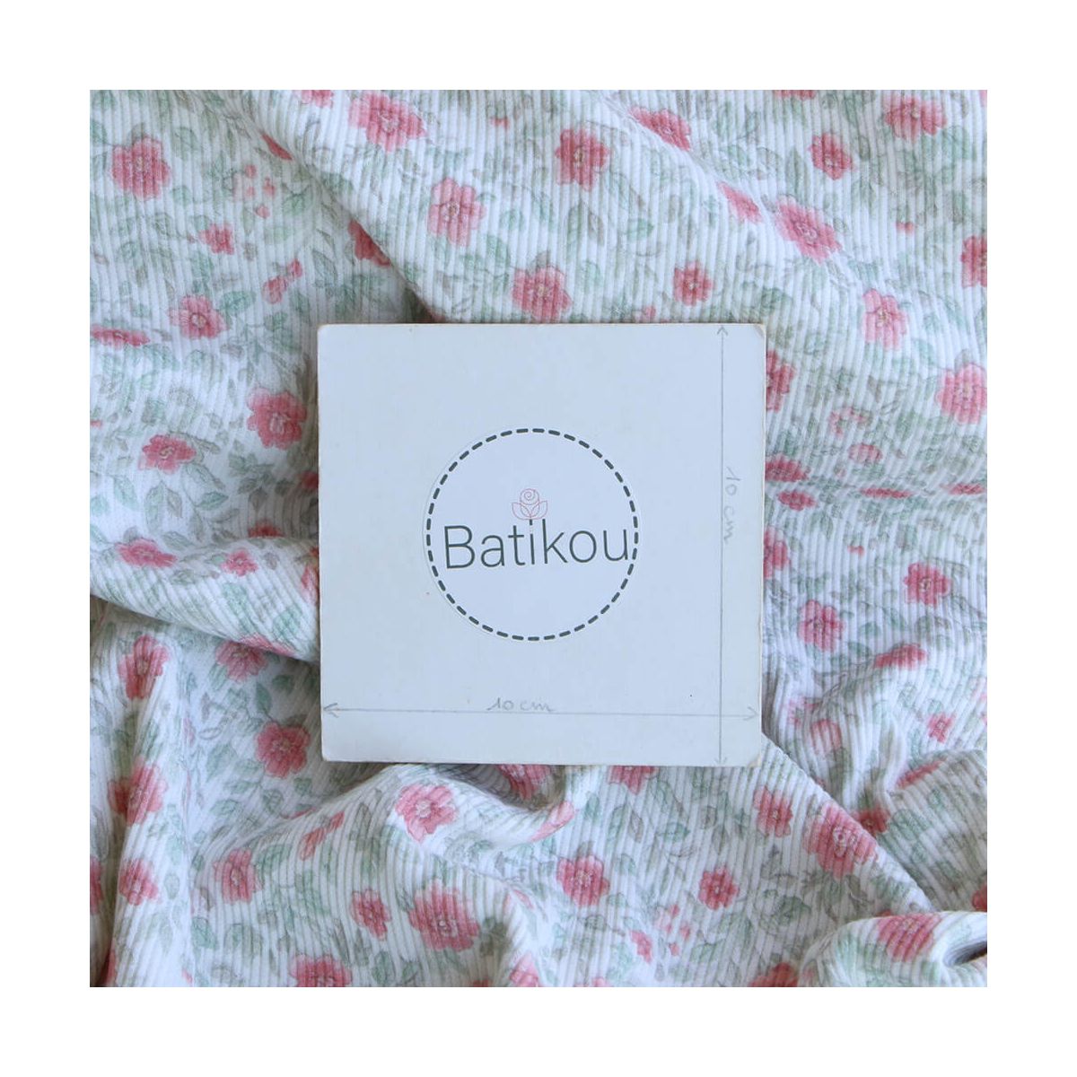 Jersey coton côtes fines à motif fleuri rose et vert d'eau