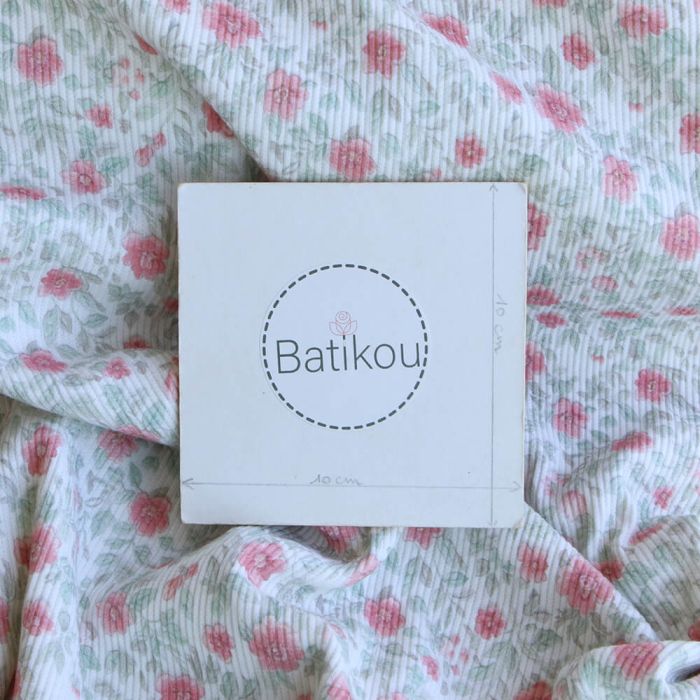 Jersey coton côtes fines à motif fleuri rose et vert d'eau