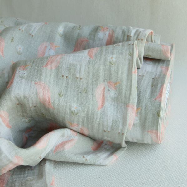 Lilirose - Double gaze de coton fond vert amande tendre imprimé licornes