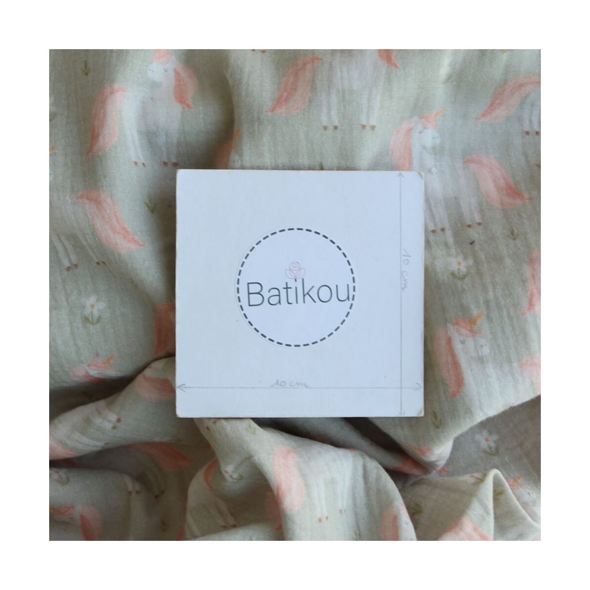 Lilirose - Double gaze de coton fond vert amande tendre imprimé licornes