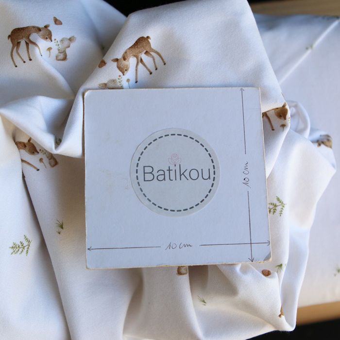 Jersey de coton fond blanc lait imprimé petites biches et lapins