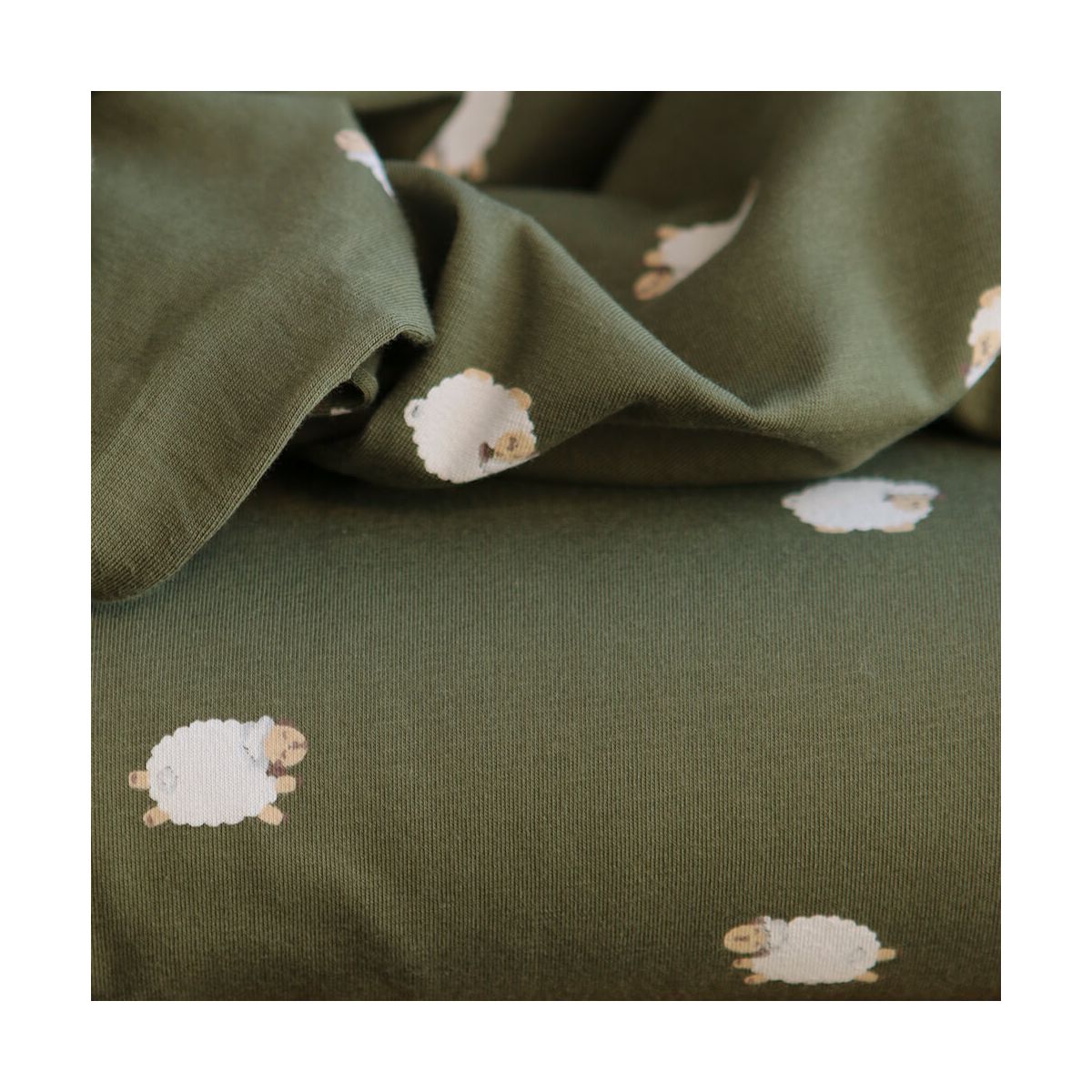 Jersey de coton fond vert olive imprimé petits moutons