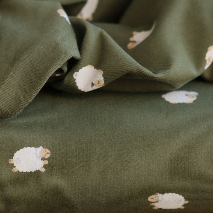 Jersey de coton fond vert olive imprimé petits moutons