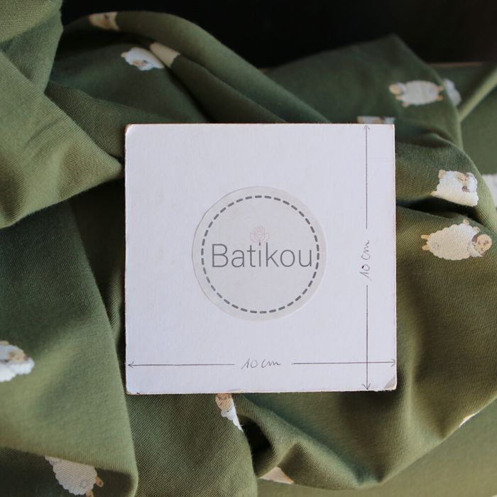 Jersey de coton fond vert olive imprimé petits moutons