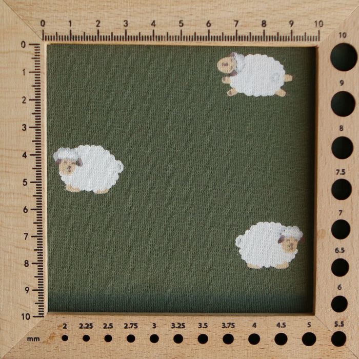 Jersey de coton fond vert olive imprimé petits moutons