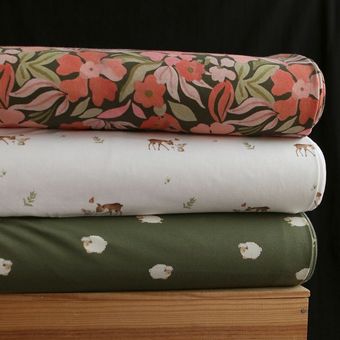 Jersey de coton fond vert olive imprimé petits moutons