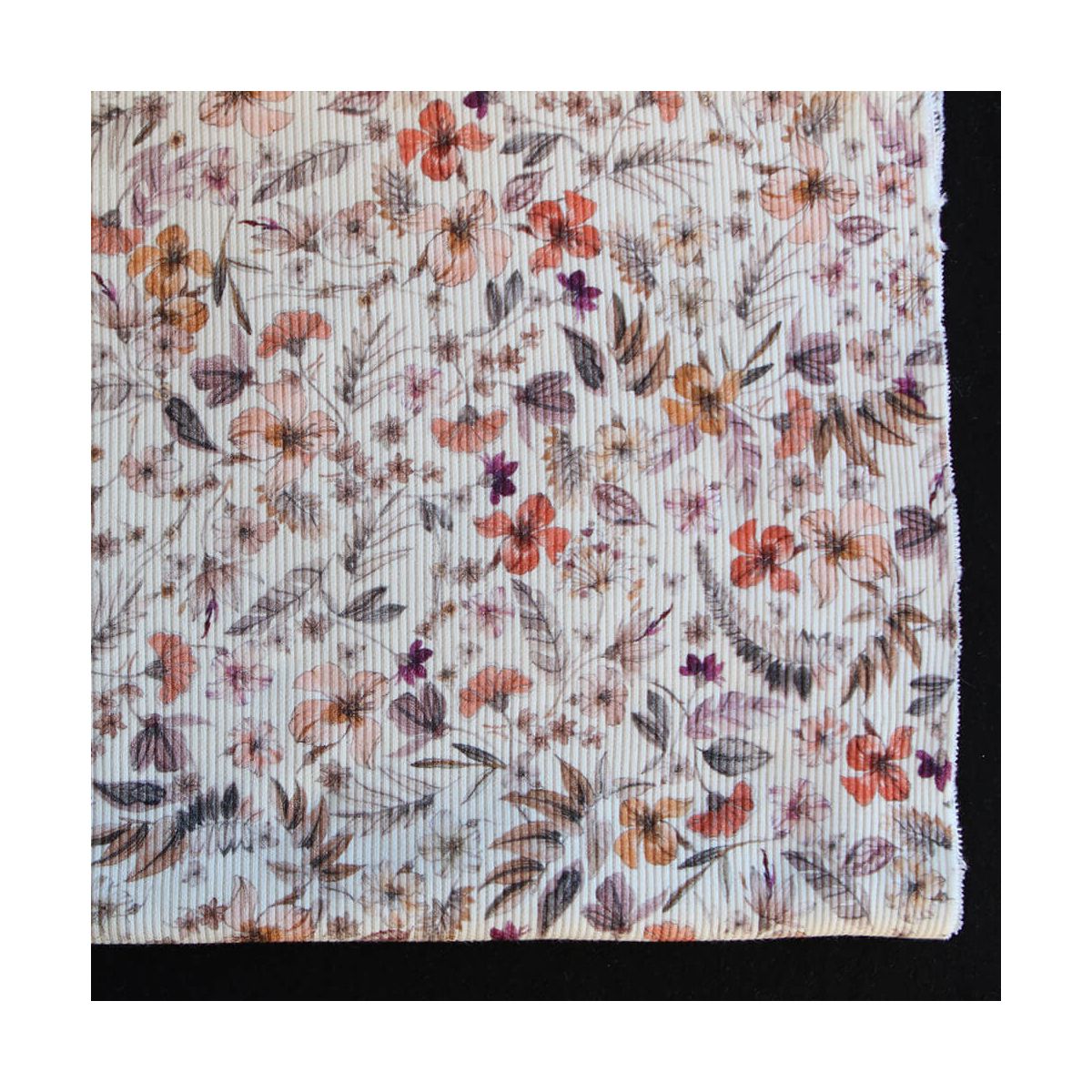 Jersey coton côtes fines à motif fleuri sur fond écru