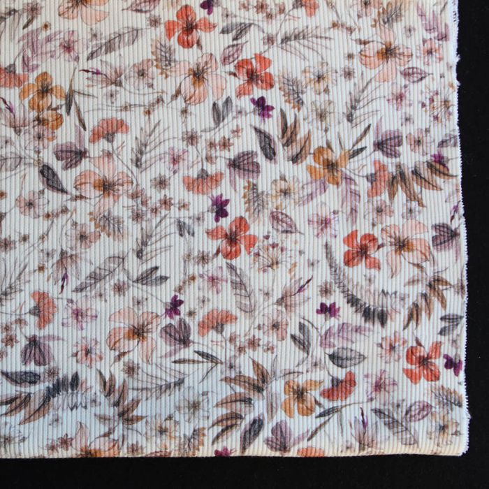 Jersey coton côtes fines à motif fleuri sur fond écru