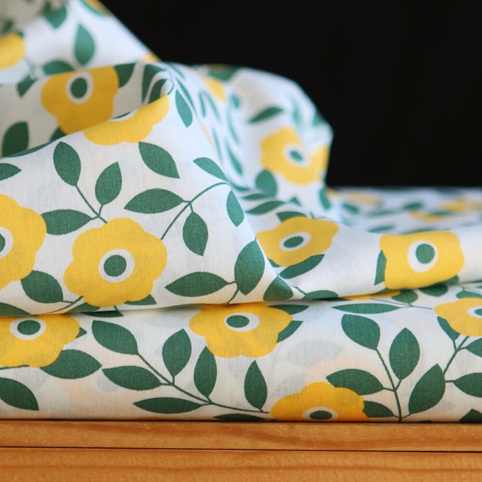 Popeline de coton imprimé fleurs vert et jaune