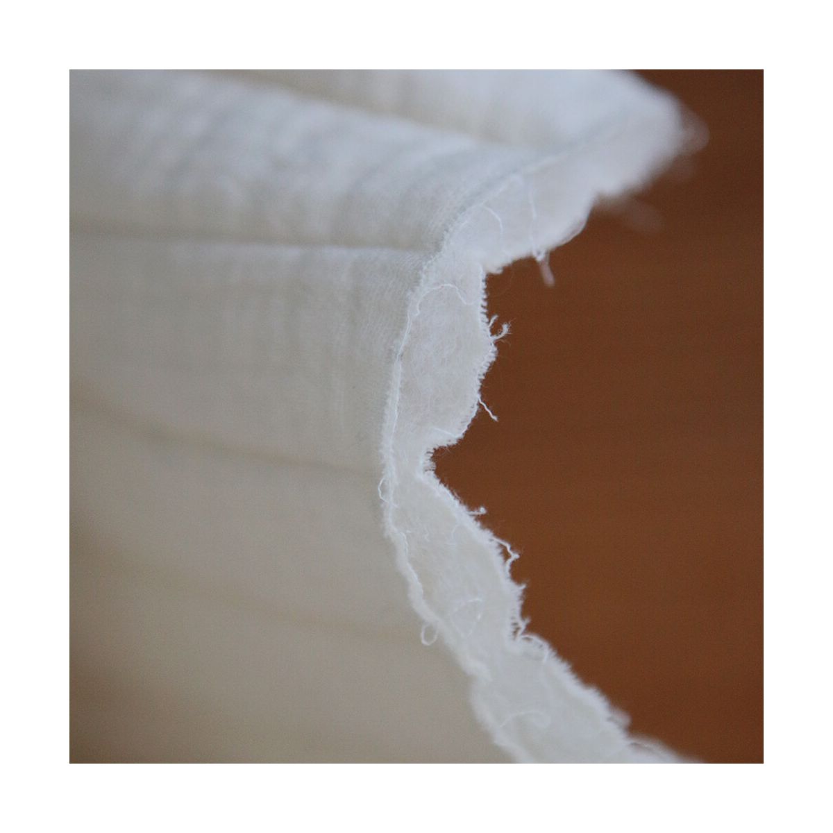 Tissu matelassé double gaze coton uni écru rayures