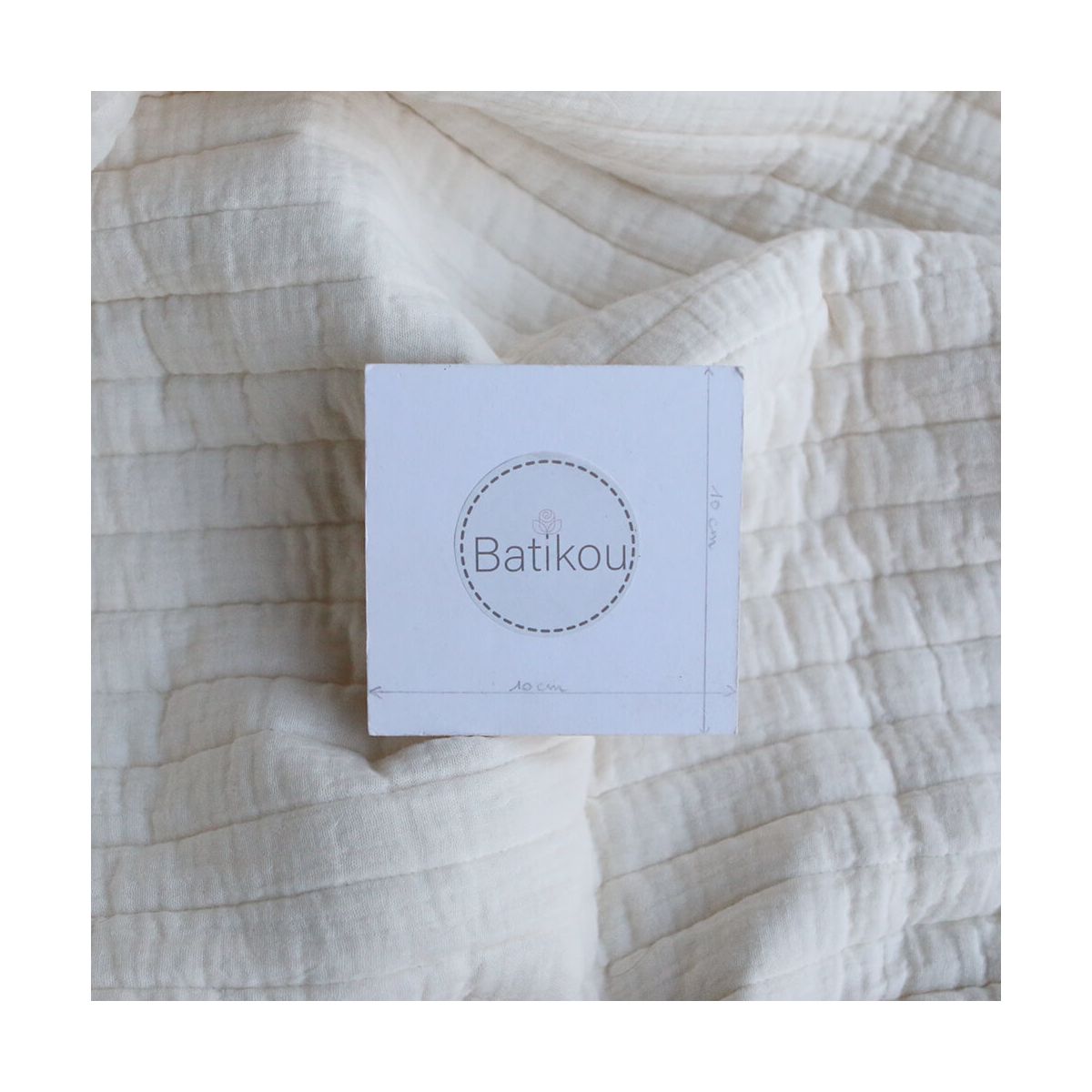 Tissu matelassé double gaze coton uni écru rayures