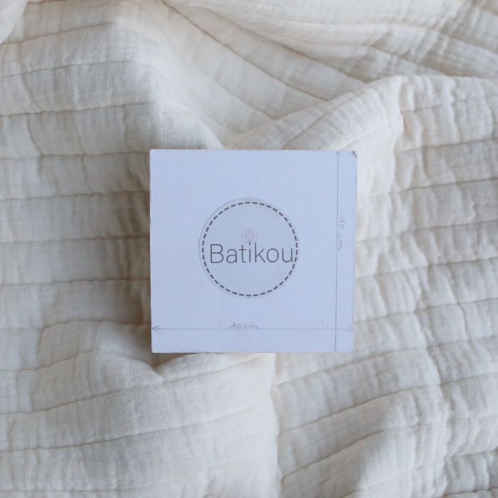 Tissu matelassé double gaze coton uni écru rayures