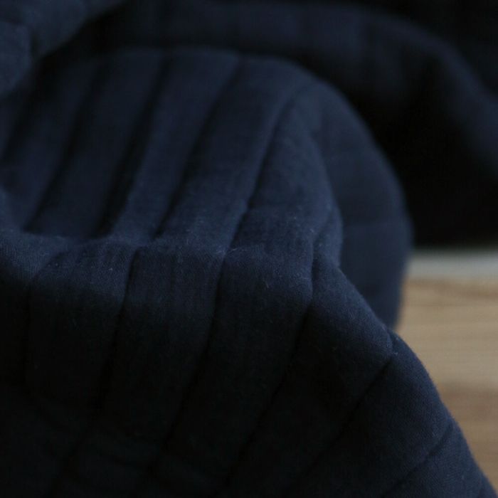 Tissu matelassé double gaze coton uni noir rayures