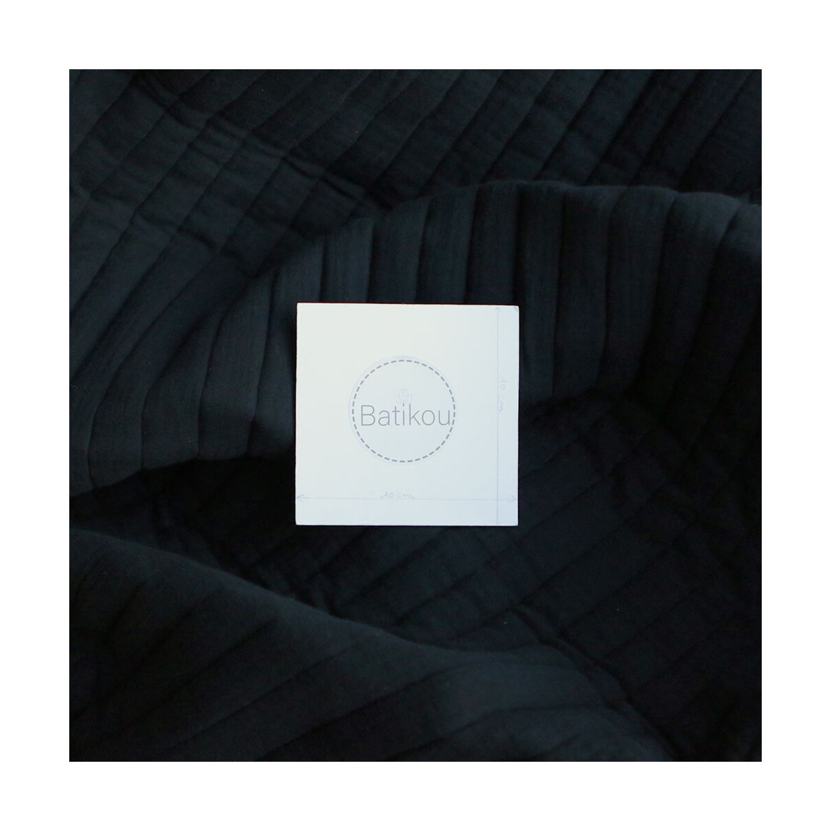 Tissu matelassé double gaze coton uni noir rayures