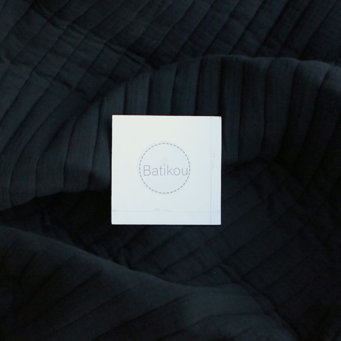 Tissu matelassé double gaze coton uni noir rayures