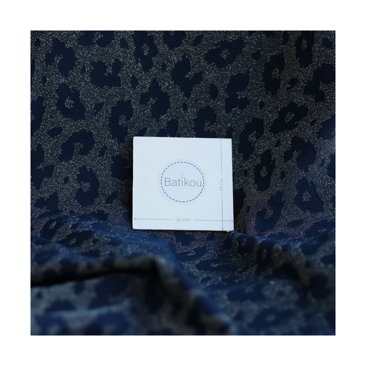 Jersey jacquard à motif graou ton sur ton bleu marine doré