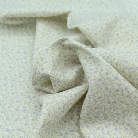 Tissu sergé de coton organique imprimé feuillage et fleurs parme
