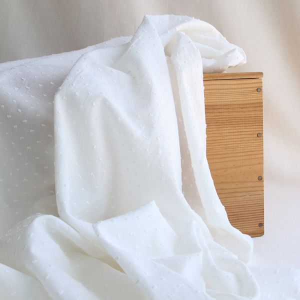 Plumetis de coton coloris blanc ivoire