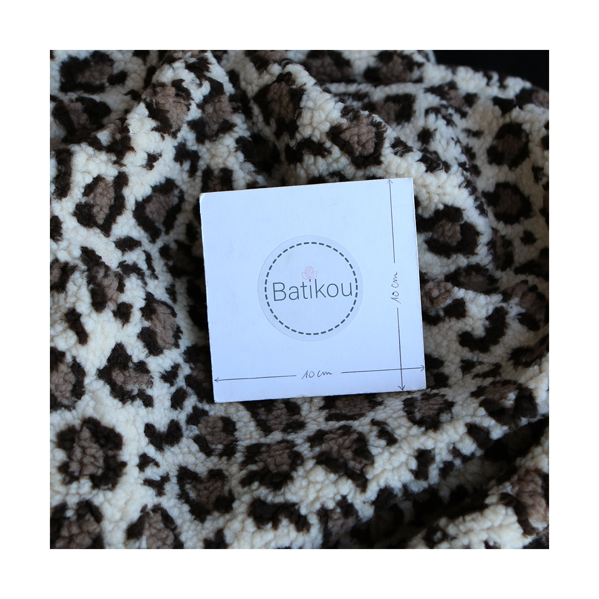 Teddy Sherpa bouclé fond beige clair motif graou