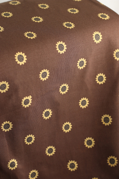 Jersey coton à motif fleurs de tournesol fond chocolat 2