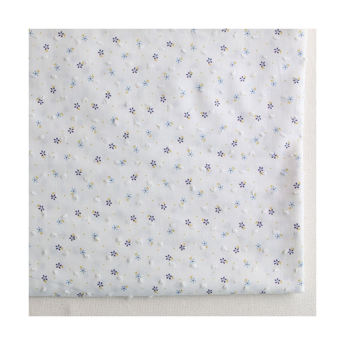 Plumetis de coton BIO petit motif fleuri bleu et pois