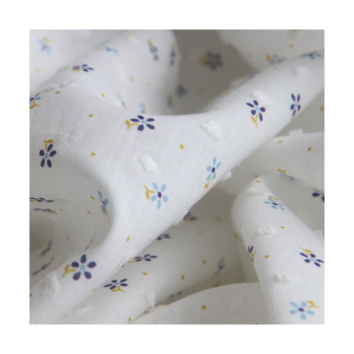 Plumetis de coton BIO petit motif fleuri bleu et pois