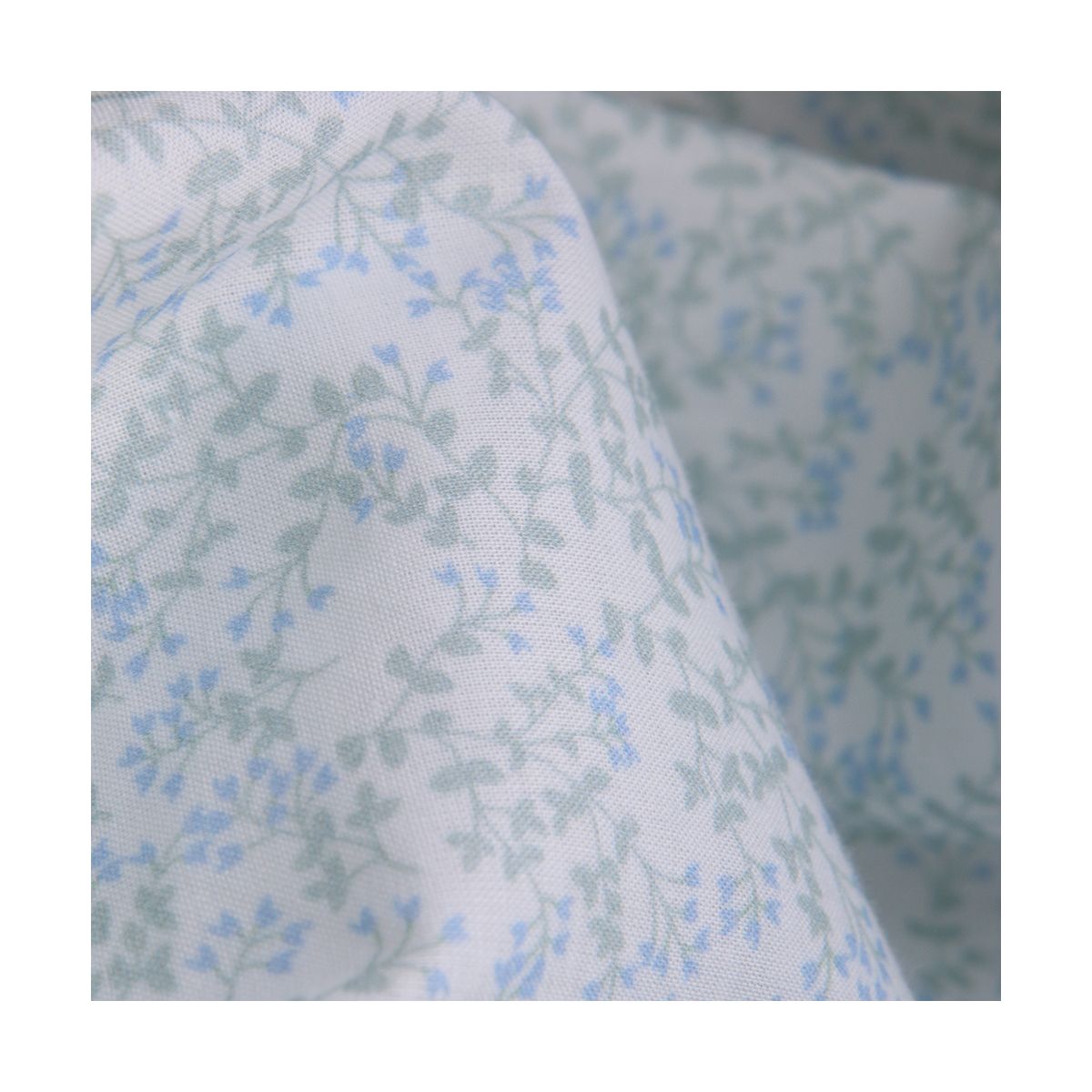Batiste de coton BIO douce petit motif fleuri bleu vert tendre