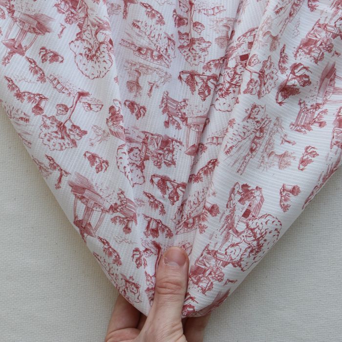 Eleonore - Tissu coton texturé imprimé toile de Jouy coloris lie de vin