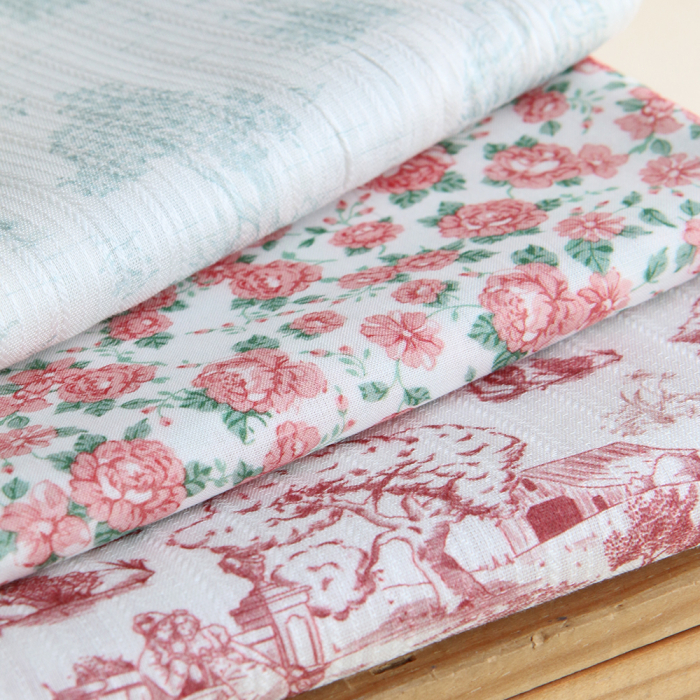Tissu coton organique BIO fleuri vintage batiste motif fleuri corail