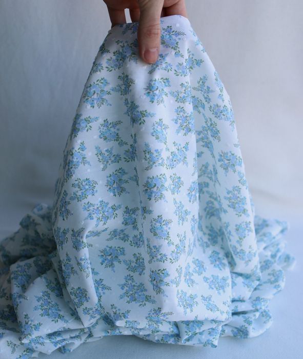 Plumetis de coton BIO petit motif fleuri bleu turquoise