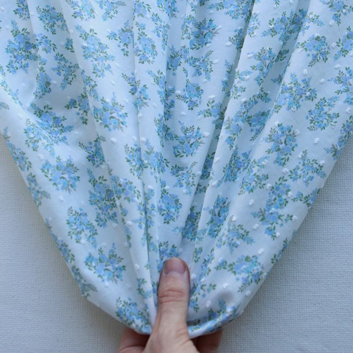 Plumetis de coton BIO petit motif fleuri bleu turquoise