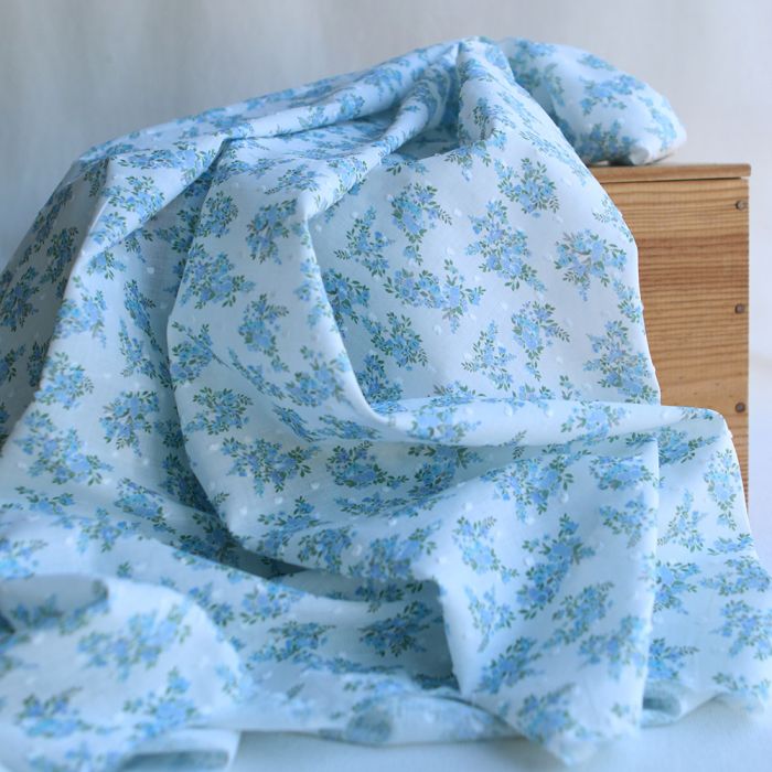 Plumetis de coton BIO petit motif fleuri bleu turquoise