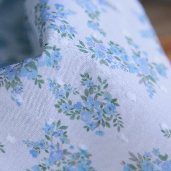 Plumetis de coton BIO petit motif fleuri bleu turquoise 2