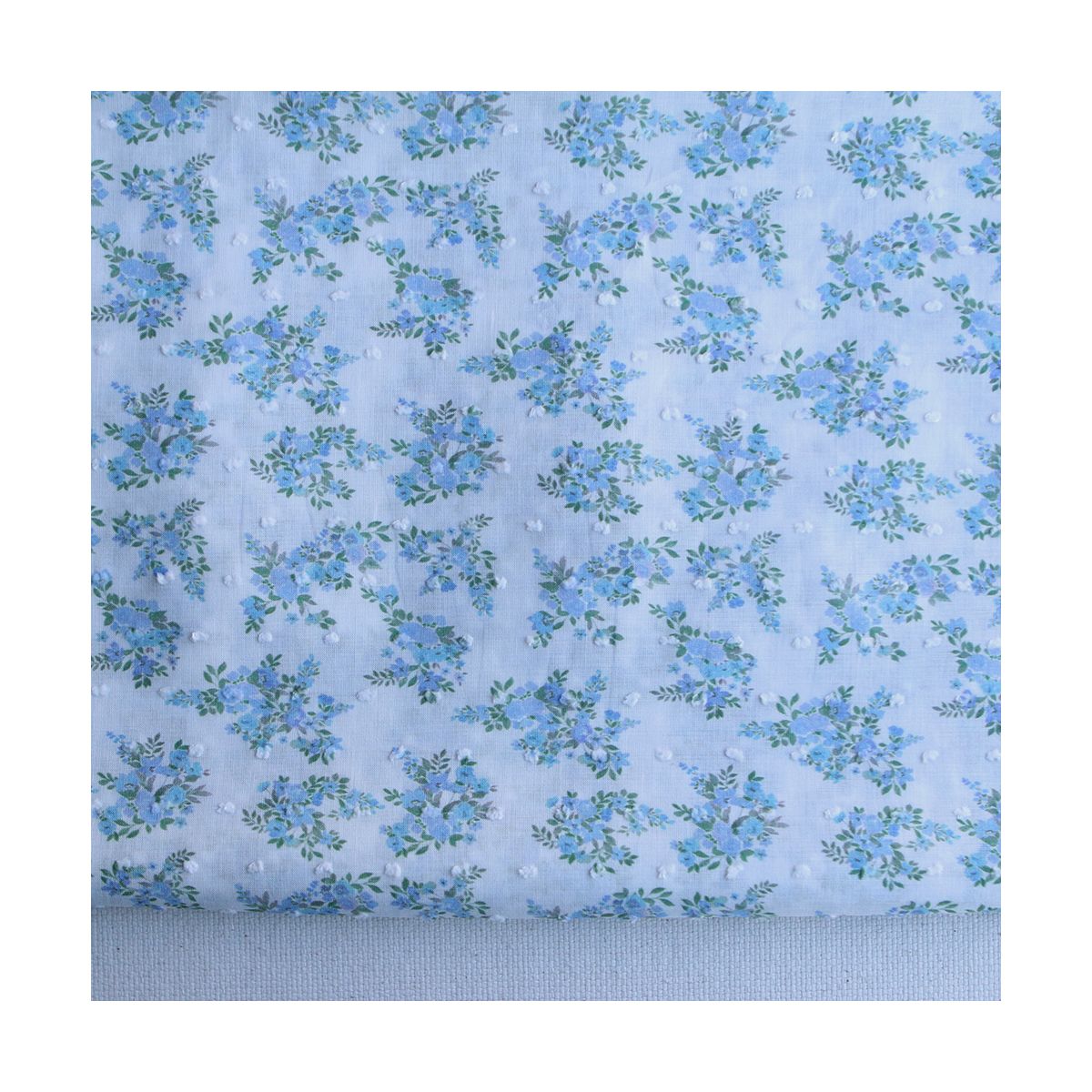Plumetis de coton BIO petit motif fleuri bleu turquoise