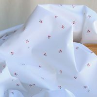 Popeline de coton BIO fond blanc mini cerises
