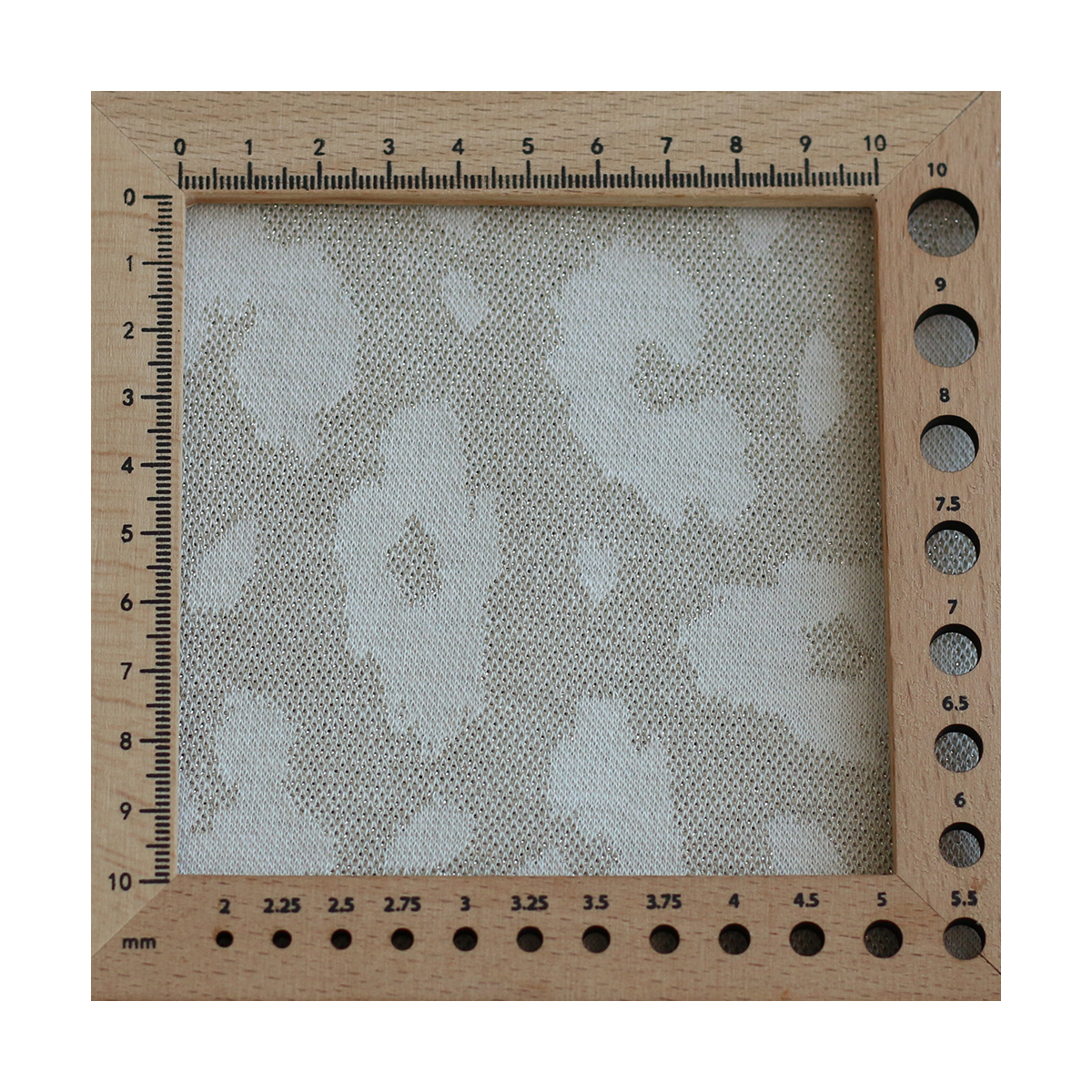 Jersey jacquard à motif graou ton sur ton écru doré
