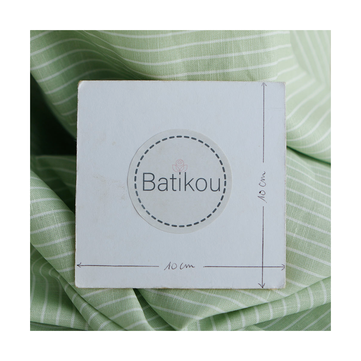 Baptiste - Tissu lin coton rayure 1mm blanc lait et vert amande